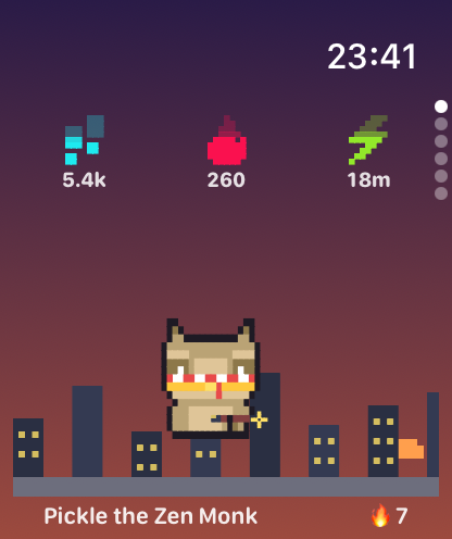 A raccoon in the city at dusk